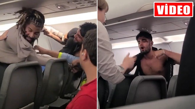 ABD'de Frontier Airlines uçağında çıkan kavga yolcularin cep telefonlarıyla görüntülendi.